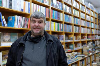 Raed Al Muhtaseb stands in his bookshop in downtown Amman. Amy McConaghy / The National