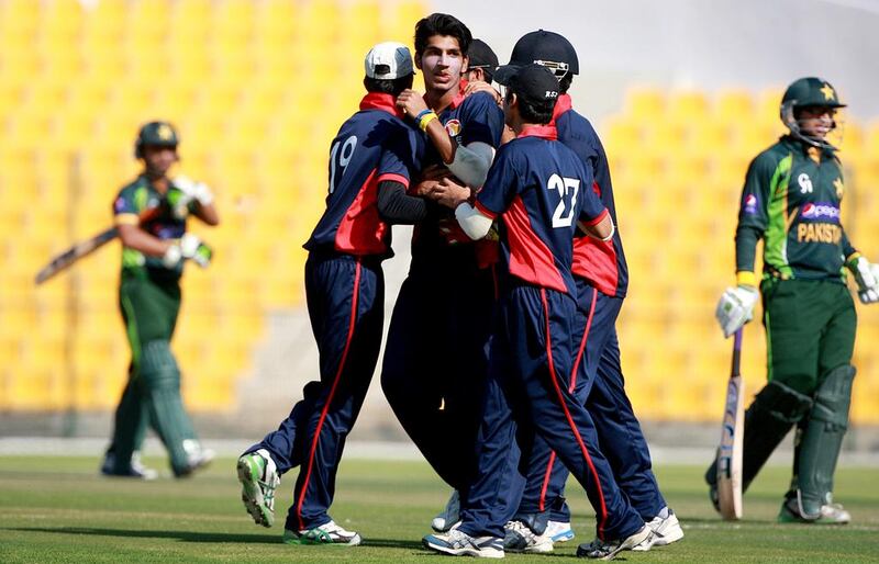 UAE team celebrates the dismissal of Sami Aslam of Pakistan at the Zayed Cricket Stadium. Satish Kumar / The National
