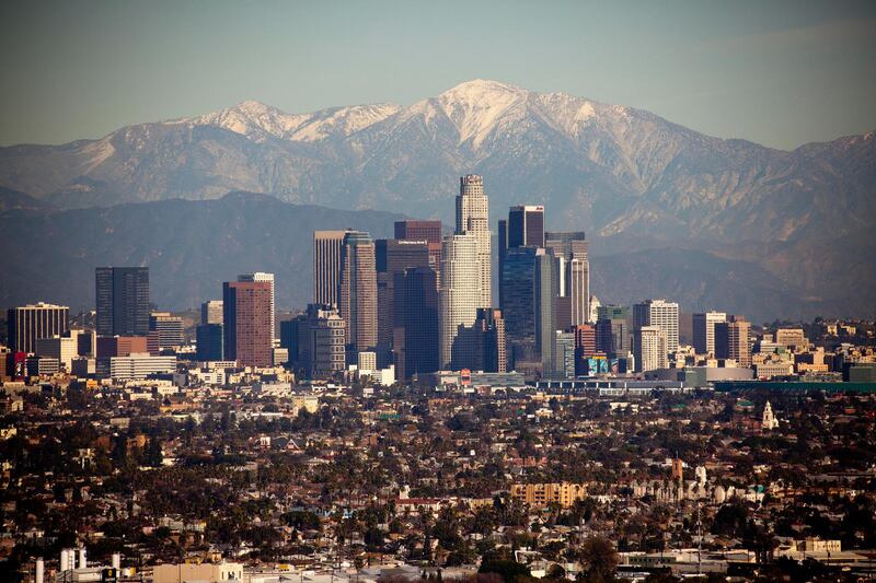 Downtown Los Angeles Skyline with the snow capped mountains in the background. Taken from Kenneth Hahn State Park. Getty Images