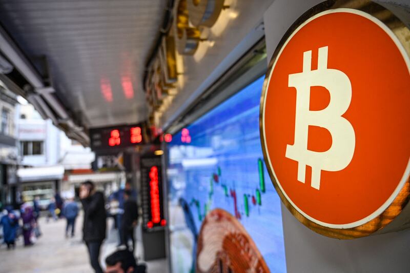 A Bitcoin symbol at a cryptocurrency exchange in Istanbul. The digital asset has been weighed down by risk aversion as central banks raise rates. AFP