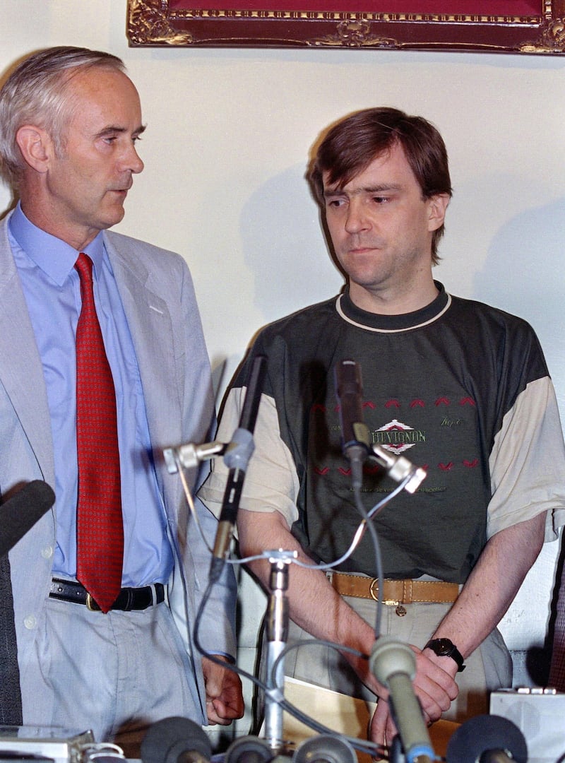 A free British hostage John McCarthy (L), 34, addresses media during a press conference held 08 August 1991 at Syrian Foreign Ministry in Damascus, after being released in Beirut by clandestine "Islamic Jihad" after more than five years spent in captivity. McCarthy was kidnapped in Beirut in 1986. At left, British Ambassador to Syria, Andrew Flemming-Green. (Photo by RAMZI HAIDAR / AFP)