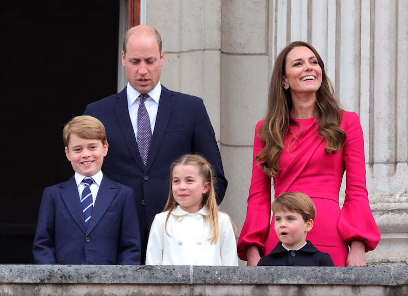 Prince William, Kate, Duchess of Cambridge, Prince George, Princess Charlotte and Prince Louis on the balcony of Buckingham Palace in June. AP