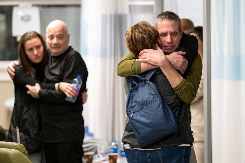Fernando Simon Marman and Louis Hare, two Israeli hostages who, according to the Israeli military, were freed in a special forces operation in Rafah, reunite with loved ones at Sheba Medical Centre, in Ramat Gan, Israel, in February.  Reuters