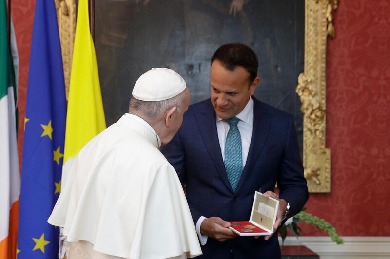 Pope Francis exchanges gifts with Irish Prime Minister Leo Varadkar. AP Photo