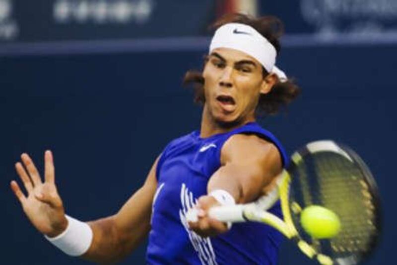 Rafael Nadal returns a shot to Andy Murray during their semi-final match at the Rogers Cup tennis tournament in Toronto.