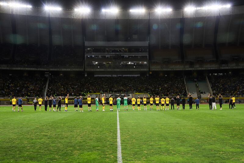 Players of Sepahan wave to spectators after their AFC Champions League group match against Al Ittihad was cancelled. EPA