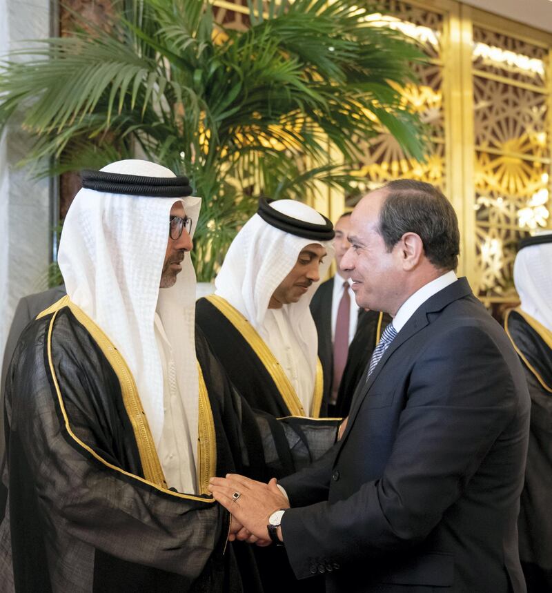 ABU DHABI, UNITED ARAB EMIRATES - November 13, 2019: HH Sheikh Hamed bin Zayed Al Nahyan, Chairman of the Crown Prince Court of Abu Dhabi and Abu Dhabi Executive Council Member (L) greets HE Abdel Fattah El Sisi, President of Egypt (R), at the Presidential Airport.

( Mohamed Al Hammadi / Ministry of Presidential Affairs )
---