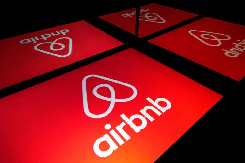 (FILES) In this file illustration photo taken on November 22, 2019 shows the logo of the online lodging service Airbnb displayed on a tablet in Paris. Airbnb on April 6, 2020 announced it was taking a billion dollars in new investment to endure and, it hopes, thrive in a travel world transformed by the coronavirus pandemic. / AFP / Lionel BONAVENTURE
