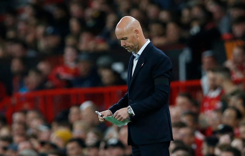 Manchester United manager Erik ten Hag looks puzzled on the touchline. Reuters
