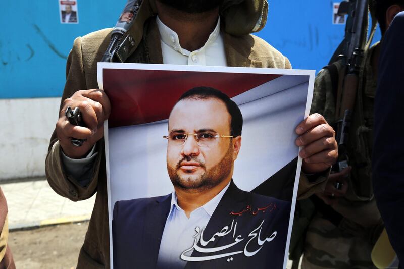 epa06694524 A pro-Houthi Yemeni holds a portrait of late senior Houthi leader Saleh al-Samad, during a rally against his killing by a Saudi-led airstrike, in Sana'a, Yemen, 26 April 2018. According to reports, pro-Houthi Yemenis gathered on the streets of the capital Sana'a to protest the killing of the political leader of Houthi rebels Saleh al-Samad who was killed in a Saudi-led airstrike a week ago.  EPA/YAHYA ARHAB