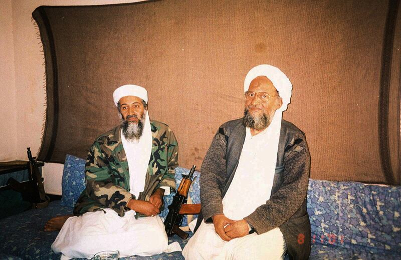 FILE PHOTO: Osama bin Laden sits with his adviser Ayman al-Zawahiri, an Egyptian linked to the al Qaeda network, during an interview with Pakistani journalist Hamid Mir (not pictured) in an image supplied by Dawn newspaper November 10, 2001.   Hamid Mir/Editor/Ausaf Newspaper for Daily Dawn/Handout via REUTERS/ THIS IMAGE HAS BEEN SUPPLIED BY A THIRD PARTY.  / File Photo