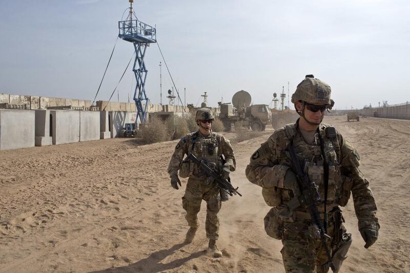 US military soldiers move through Qayyarah West coalition base in Qayyarah, some 50 kilometres south of Mosul, Iraq on November 9, 2016. Now that Donald Trump will be the next US president, all eyes are on his policies on ISIL and the Middle East. Marko Drobnjakovic/AP Photo