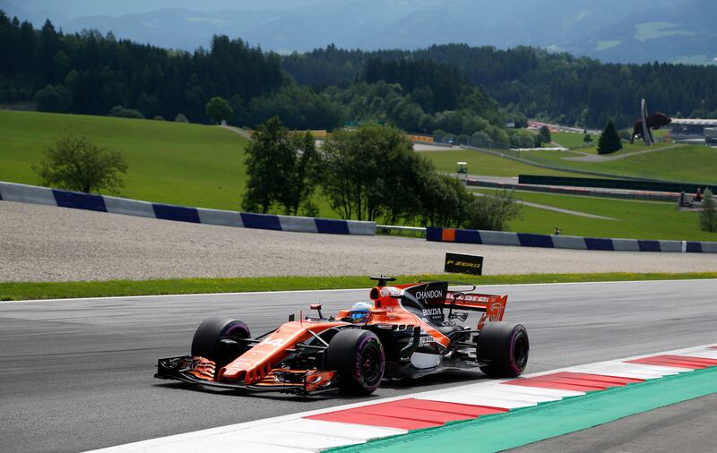 McLaren driver Fernando Alonso of Spain at the Austrian Formula One Grand Prix this month. McLaren Group, majority owned by Bahraini outfit Mumtalakat, is open to the idea of overhauling revenue payments. AP : Darko Bandic