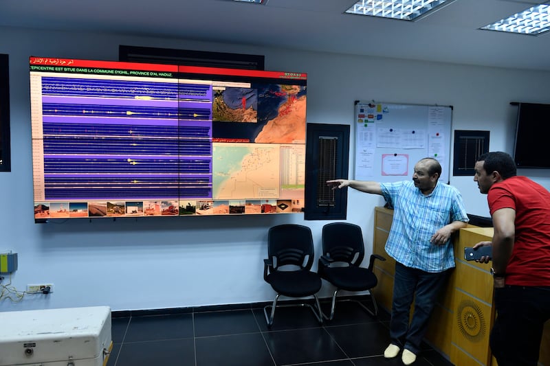 Employees of Morocco's National Institute of Geophysics in Rabat monitor earthquake developments on a screen. EPA