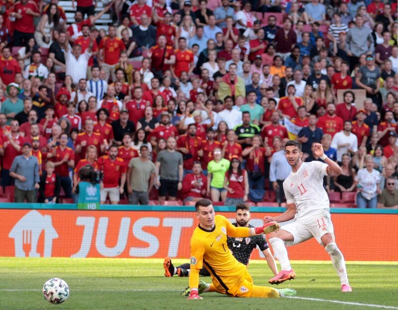 Ferran Torres makes it 3-1 to Spain.