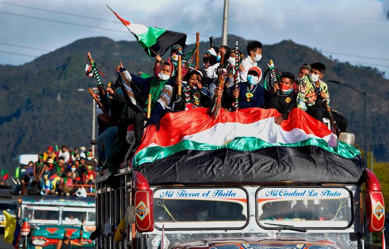 Colombian indigenous people arrive in Bogota to demand a meeting with Colombian President Ivan Duque on October 18, 2020. AFP