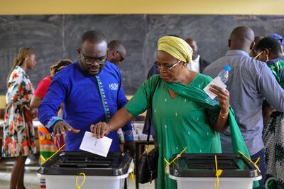 A woman casts her ballot in Gabon's capital, Libreville, during elections held on August 26. EPA