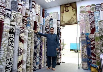 Abu Dhabi,Feb, 25, 2018: Mosa Khan Adbul Qadir pose during the interview at his Carpet shop in Abu Dhabi.  Satish Kumar for the National / Story by Anna Zacharias