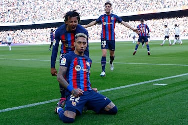 Barcelona's Raphinha celebrates scoring his side's opening goal during Spanish La Liga soccer match between Barcelona and Valencia at the Camp Nou stadium in Barcelona, Spain, Sunday, March 5, 2023.  (AP Photo / Joan Monfort)