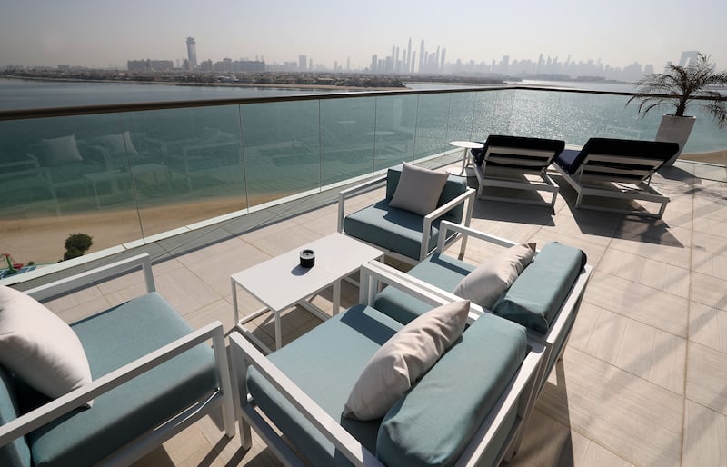 Each room in the all-suite hotel has a balcony with views of the Arabian Gulf and Palm Jumeirah.