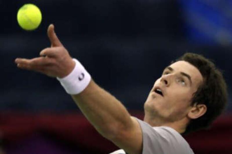 Britain's Andy Murray serves against Viktor Troicki, beating his opponent 6-3 6-3 in the second round of the St Petersburg Open.