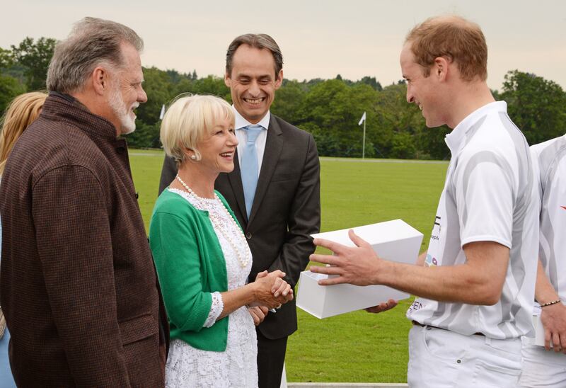 From left, American director Taylor Hackford, UK actress Helen Mirren and Andre Konsbruck from Audi UK with Prince William at day one of the Audi Polo Challenge at Coworth Park Polo Club on May 31, 2014 in Ascot, England. Getty Images for Audi