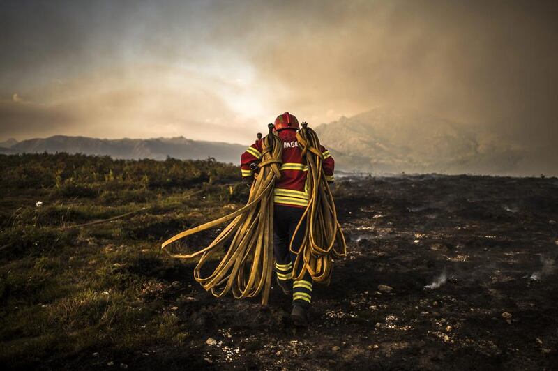 Firemen tackle the forest fire in the area of Vila do Soajo, northern Portugal. EPA