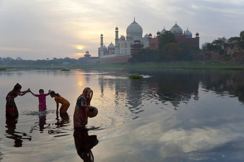 The Taj Mahal, built by the Mughal emperor Shah Jahan on the Yamuna River, is the main tourist attraction in Agra. Peter Adams / JAI / Corbis