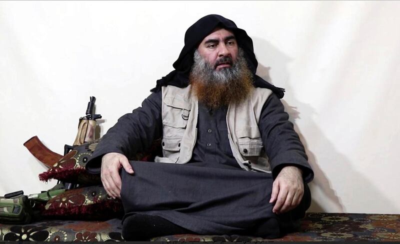 FILE - This file image made from video posted on a militant website April 29, 2019, purports to show the leader of the Islamic State group, Abu Bakr al-Baghdadi, being interviewed by his group's Al-Furqan media outlet. The leader of the Islamic State group released a new alleged audio recording Monday, Sept. 16, 2019, calling on members of the extremist group to do all they can to free IS detainees and women held in jails and camps. (Al-Furqan media via AP, File)