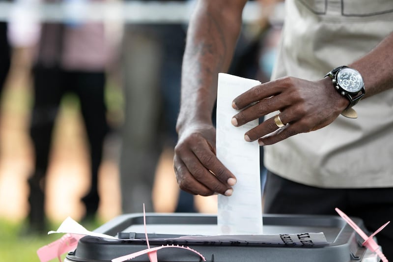 Opposition candidate, Bobi Wine casts his vote. Getty Images