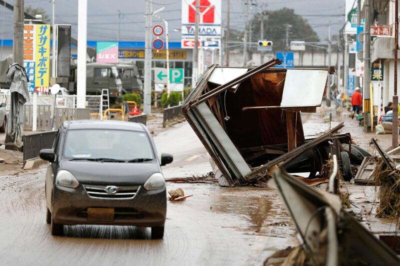 Debris caused by Typhoon Hagibis are left on a street in Motomiya, Fukushima prefecture, Japan. AP