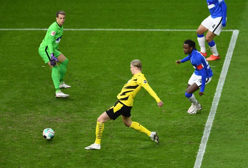 Dortmund's Erling Braut Haaland scores their first goal. AFP