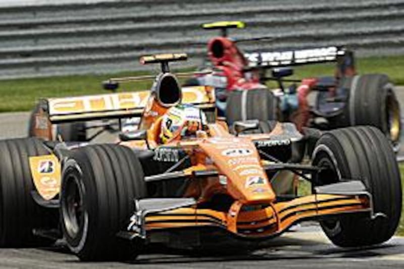 Adrian Sutil takes a corner in his Spyker at the 2007 US grand prix in Indianapolis, the last time the sport went to America.