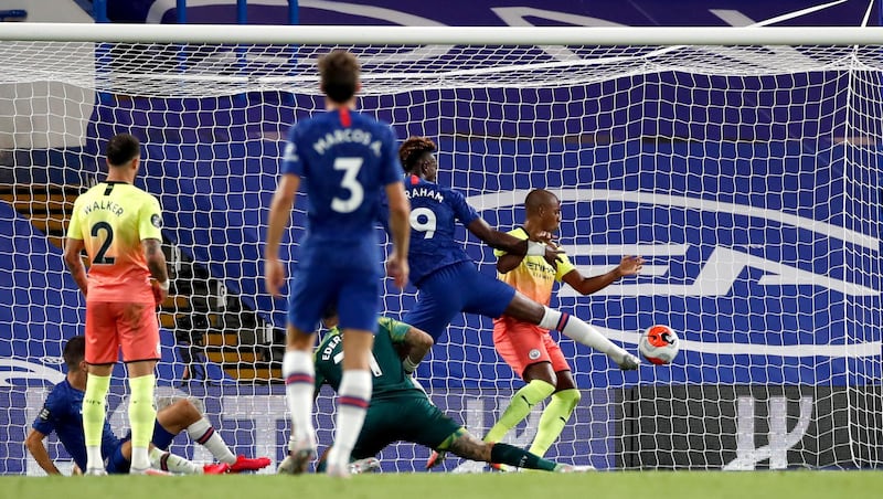 Manchester City's Fernandinho handles the ball on the line to give away a penalty and earn himself a red card. PA