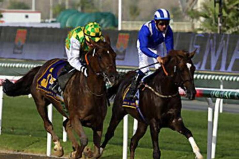 Eric Lemartinel, who saddled Mizzna to victory in the Dubai World Cup's Kahayla Classic, above, is hopeful of another big season on the UAE tracks.