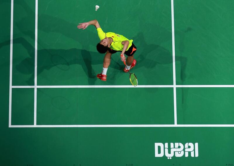 Chen Long of China in action against Hans-Kristian Vittinghus of Denmark in the men’s singles final at the BWF Destination Dubai World Superseries Finals. Warren Little / Getty Images