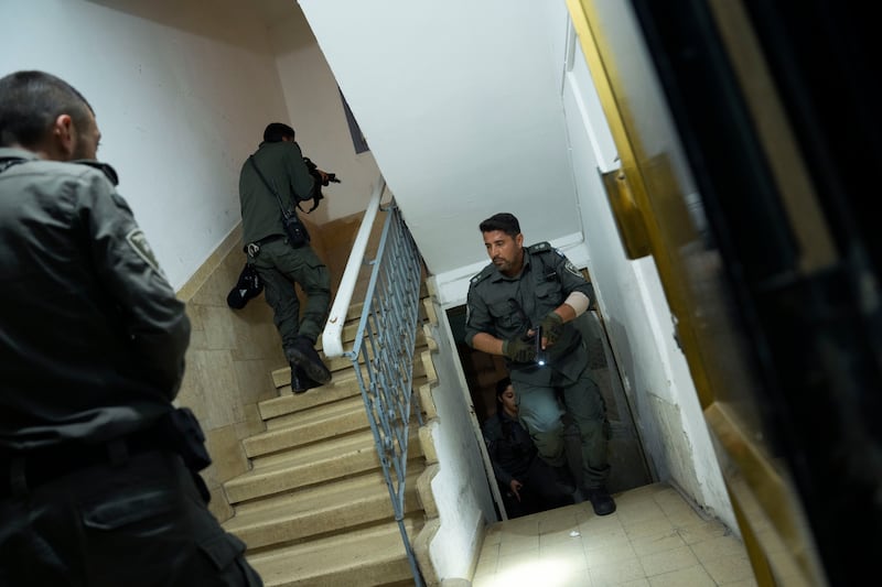 Israeli police hunt a suspect in a shooting attack in Tel Aviv. AP Photo