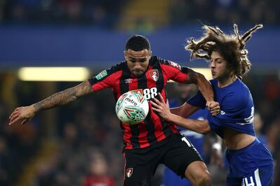 LONDON, ENGLAND - DECEMBER 20: Callum Wilson of AFC Bournemouth is challenged by Ethan Ampadu of Chelsea during the Carabao Cup Quarter-Final match between Chelsea and AFC Bournemouth at Stamford Bridge on December 20, 2017 in London, England.  (Photo by Catherine Ivill/Getty Images)
