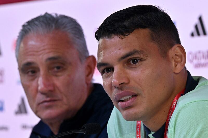 Brazil coach Tite with Thiago Silva at a press conference in Doha on November 23, 2022. AFP