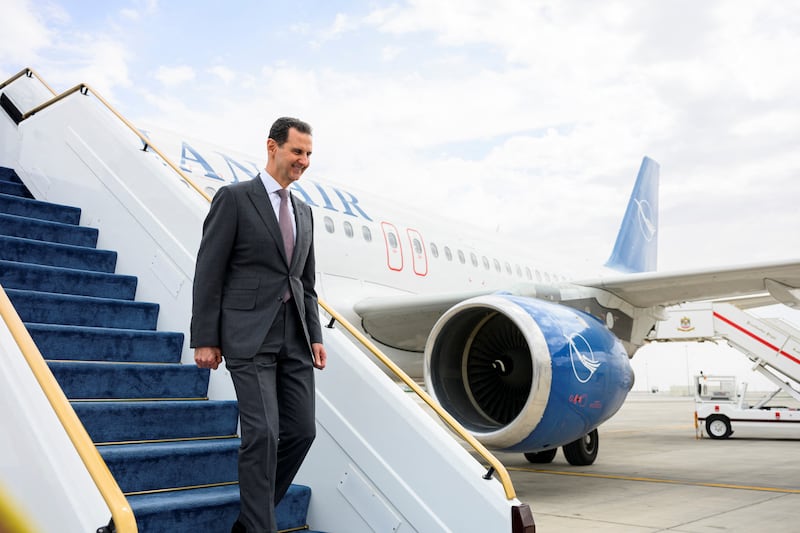 Syria's President Bashar Al Assad arrives at the Presidential Airport in Abu Dhabi on March 19, 2023. UAE Presidential Court / Reuters