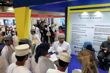 Omani graduates queue at the Job Exhibition in Muscat. Saleh Al-Shaibany for The National