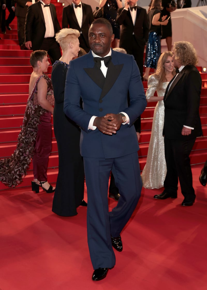 Idris Elba wears a navy tuxedo to attend the 'Three Thousand Years Of Longing (Trois Mille Ans A T'Attendre)' screening. Getty Images 