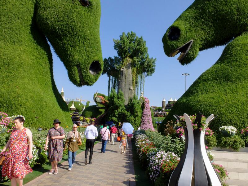 The giant horses tower over visitors to Dubai Miracle Garden.
