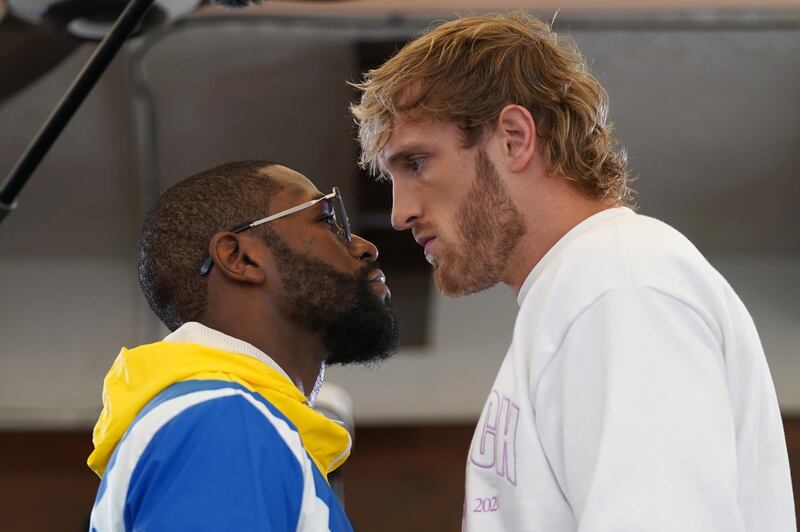 Floyd Mayweather Jr and Logan Paul face off at Villa Casa Casuarina ahead of their exhibition boxing bout. Reuters