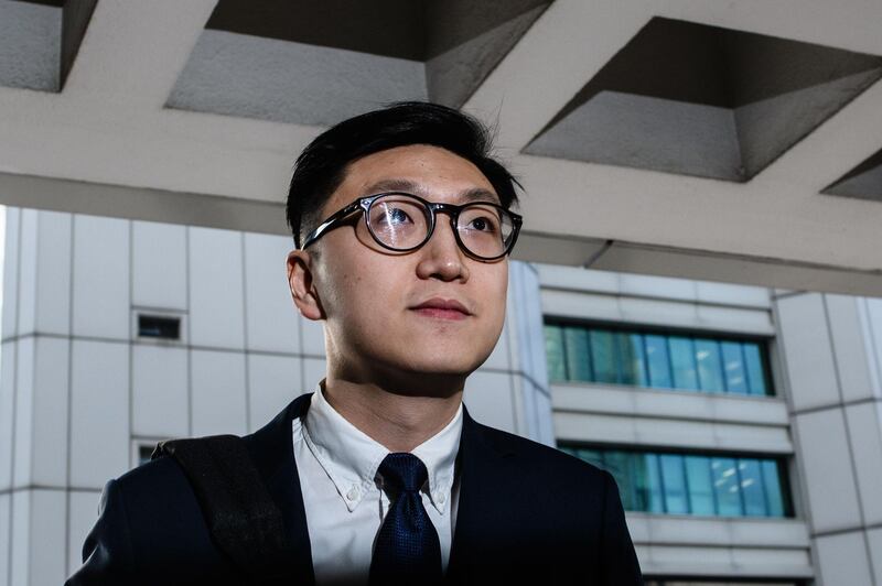 (FILES) In this file photo taken on January 18, 2018, pro-independence protestor Edward Leung arrives at the High Court before facing rioting charges in Hong Kong, for his part in the 'fishball riots' that took place in February 2016. Hong Kong's leading independence activist was jailed for six years on June 11, 2018 for his involvement in some of the city's worst protest violence for decades. / AFP / Anthony WALLACE
