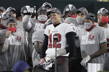 Tampa Bay Buccaneers quarterback Tom Brady holds the George Halas Trophy after defeating the Green Bay Packers in their NFL NFC Championship game at Lambeau Field in Green Bay, Wisconsin. EPA
