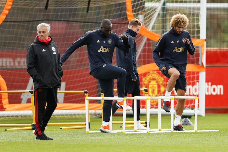 From left, Mourinho, Romelu Lukaku, Scott McTominay and Marouane Fellaini during training. Action Images via Reuters