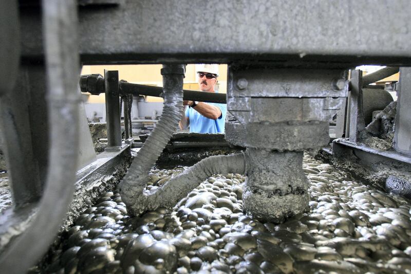 A mine worker processes gold rich metalic ore during a press tour at the Al-Amar Gold Mine, in the Riyadh region, 195kms southwest of the centre of the Saudi capital, on May 28, 2008. Al-Amar is an underground mine which is designed to process ore at a rate of 200ktpa to produce gold which is then sold to third parties for toll smelting. Construction was completed during the half year period ended 30 June 2007 and the facility is currently undergoing commissioning and production build up with full production planned for this year. AFP PHOTO/HASSAN AMMAR (Photo by HASSAN AMMAR / AFP)