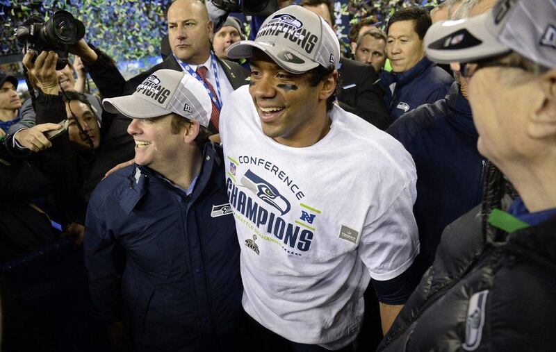 Russell Wilson celebrates after the Seahawks won the NFC championship game on Sunday. John G Mabanglo / EPA