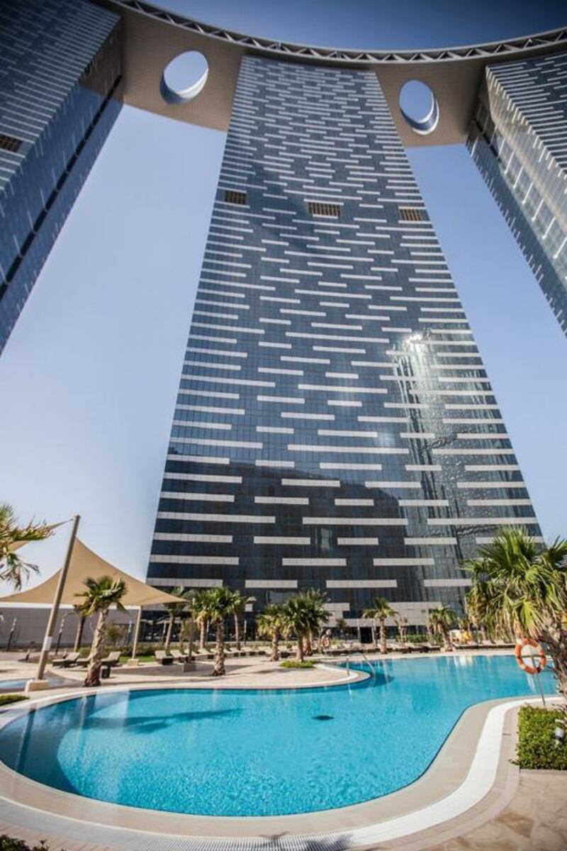 Looking up at the sky-bridge at the Gate Towers. Courtesy Aldar